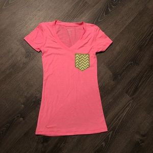 Pink t-shirt with fake Chevron pocket